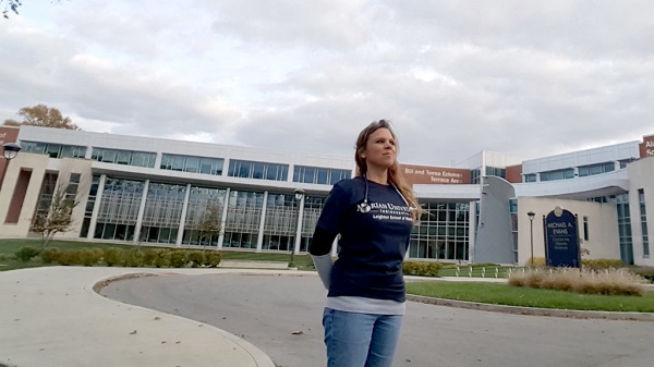 After earning an MD, she’s headed back to school — to become a nurse